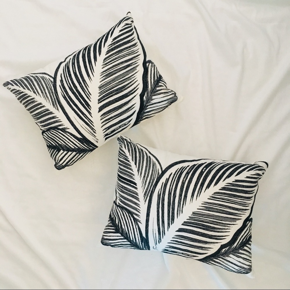 Palm print black and white pillows